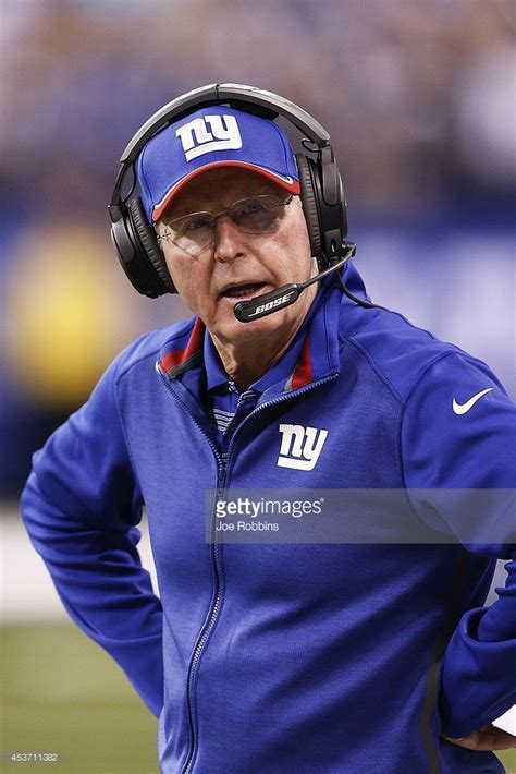 New York Giants head coach Tom Coughlin looks on in the first half of ...