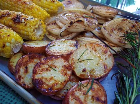 Husband's Grilled Potatoes...he adds Roasted Garlic to His and they are ...