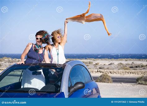 Couple of Adult Women Friends Stand Up Inside a Convertible Car Enjoy the Summer Holiday Travel ...