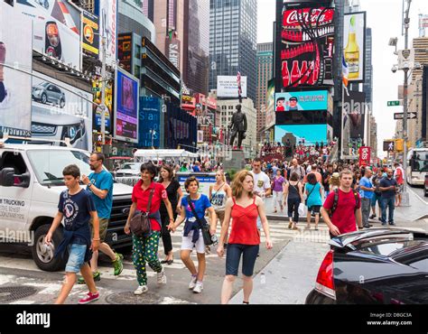 Busy Times Square in Manhattan, New York City street with crowds of ...