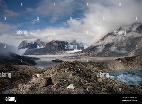 The tongue of Tupermit Glacier in Akshayuk Pass. Auyuittuq National ...