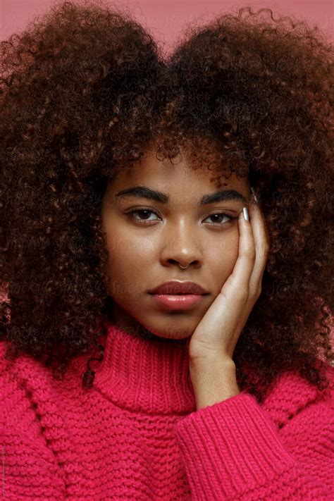 "Portrait Of A Young African American Afro Woman In Pink Studio" by Stocksy Contributor ...