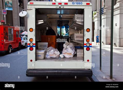 Postal delivery truck in downtown Manhattan, New York City Stock Photo - Alamy