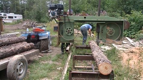 Our Homemade Bandsaw Sawmill Sure Cuts Lumber - YouTube