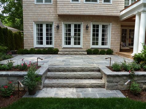 raised stone patios - Google Search | Stone patio designs, Patio railing, Patio stones