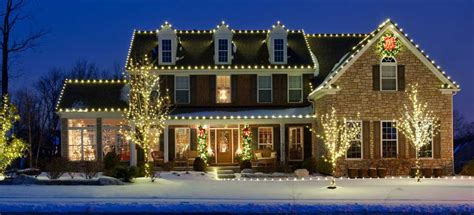 5 Reasons Why You Shouldn't Hang Christmas Lights Yourself - Pristine ...