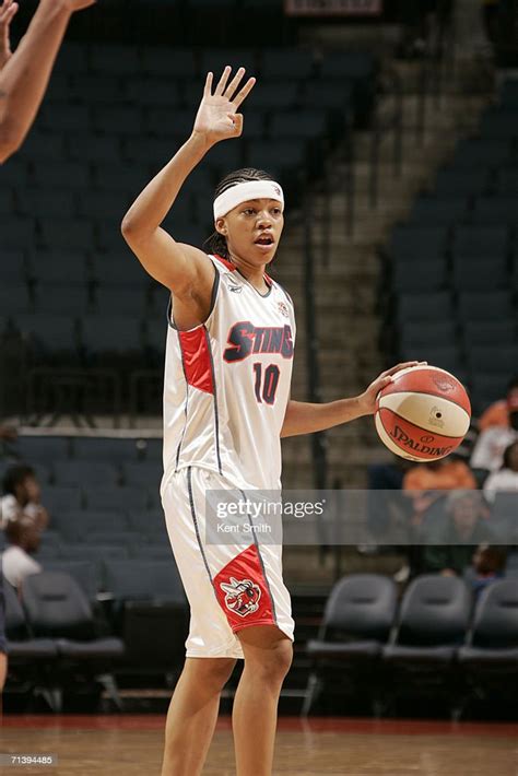 LaToya Bond of the Charlotte Sting moves the ball against the Indiana... News Photo - Getty Images