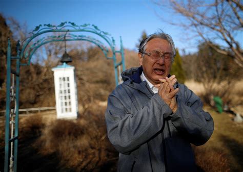 Photo essay: Tsunami survivors call lost loves on the 'phone of the wind' - The Japan Times