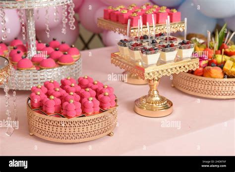 Dessert table for a party. cupcakes, sweetness and fruits Stock Photo ...