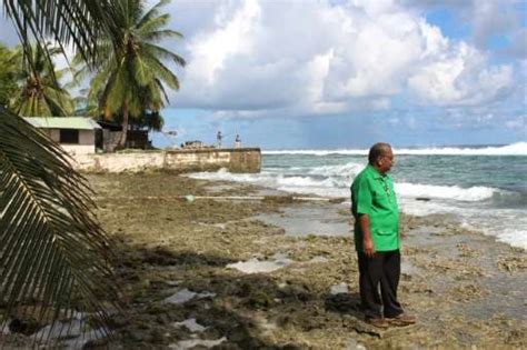 Periled by climate change, Marshall Islands makes carbon pledge