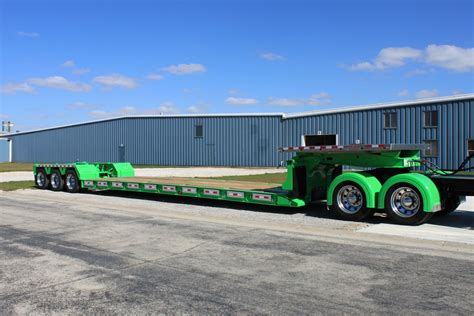 Detachable-Gooseneck-Lowboy-Trailer-Green-Triple-Axle-curb-view - Jet Co Trailers