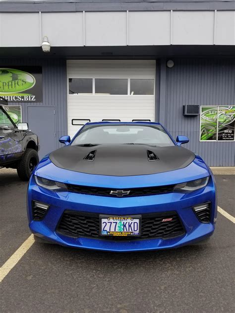 Got a carbon fiber wrap for my hood/bowties 😍 : r/camaro