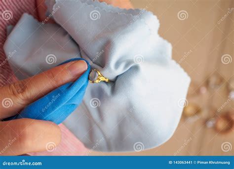 Jeweller Hand Polishing and Cleaning Gold Jewelry Ring Stock Image ...