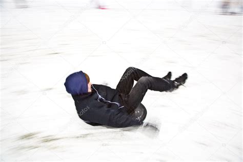 Children are sledding down the hill in snow, white winter Stock Photo ...