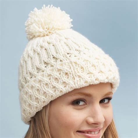 Free Bernat Aran Hat Knitting Pattern | Aran knitting patterns, Cable ...