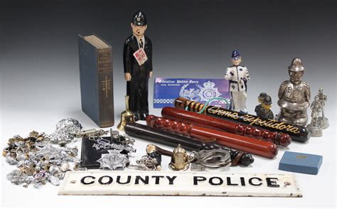 A collection of various police related items, including a County Police ...