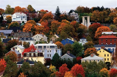 Autumn in Rhode Island, fall foliage and houses on a hillside in ...