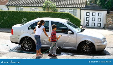 Children washing the car stock photo. Image of discipline - 3151714