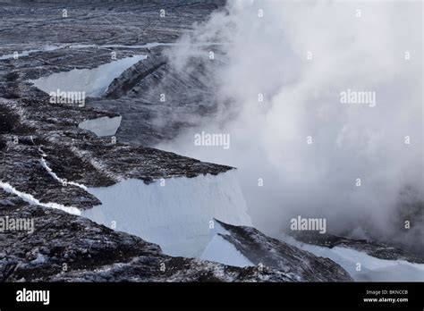 Lava flows from the Iceland 2010 volcanic eruption of the Eyjafjalla volcano are melting snow ...