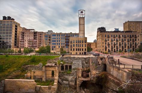 an old city with buildings and a clock tower