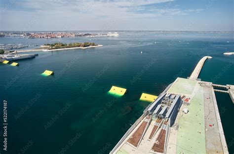 Venice MOSE tide barrier floodgates: sea level rise climate adaptation Stock Photo | Adobe Stock