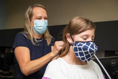 Choir director invents performer's face mask for safe singing | CBC Radio