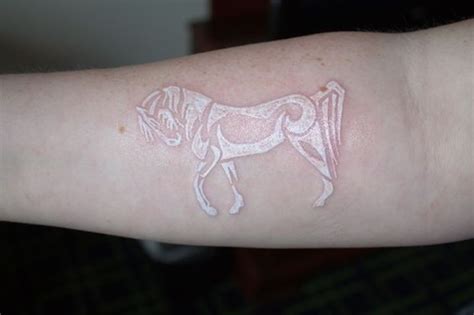 Delicate Western Tattoos That Make Us Want To Ink | White tattoo, Horse tattoo design, Wrist tattoos