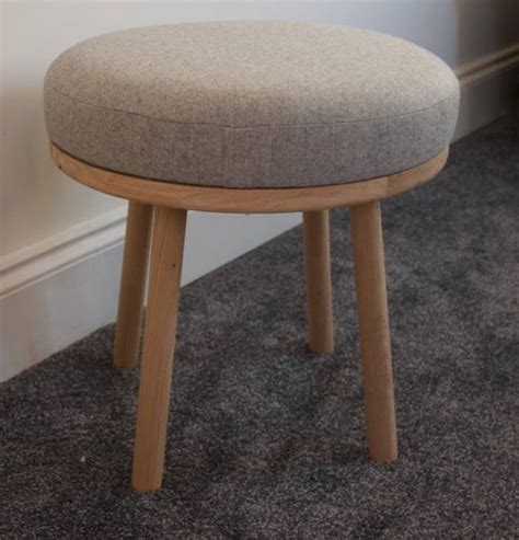 Handmade round solid European oak footstool, Upholstered in a Grey Wool and all timber is ...