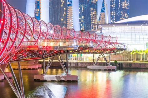 Premium Photo | Helix bridge at night in singapore