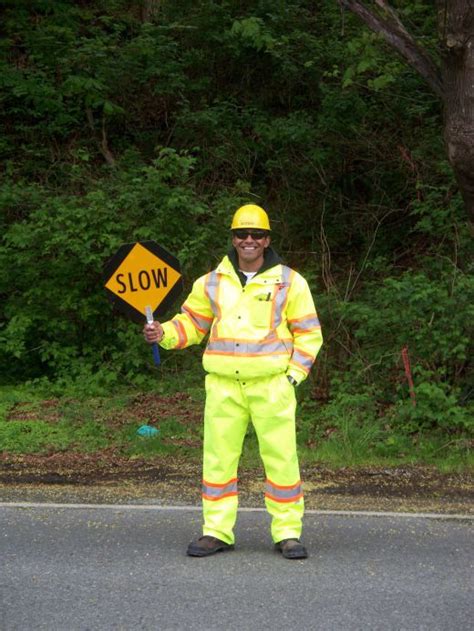 Construction Road Safety - Flaggers are Your Friend | Men in uniform, Construction, Bearded men