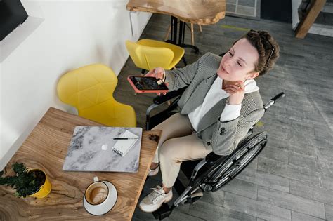 Woman Drinking Coffee while Using Laptop · Free Stock Photo