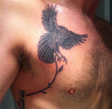 flying bird tattoo on chest