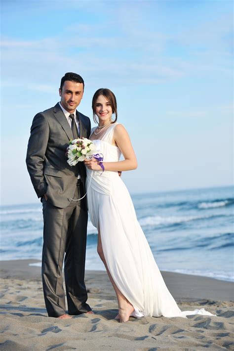 romantic beach wedding at sunset 12646869 Stock Photo at Vecteezy