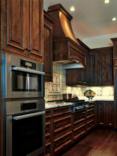 Traditional Kitchen Features Chocolate Brown Cabinets | Dark brown cabinets, Brown cabinets ...