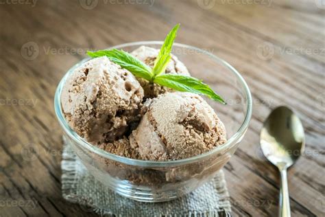 Chocolate ice cream with dessert topping 23491063 Stock Photo at Vecteezy