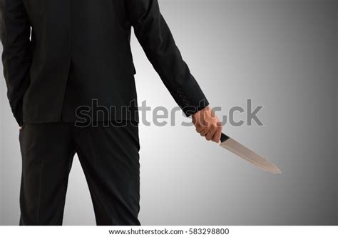 Businessman Holding Knife Stock Photo (Edit Now) 583298800