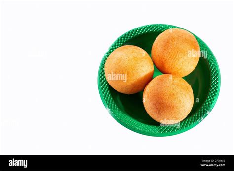 Traditional Colombian buñuelos (Deep Fried Cheese Bread) Text space Stock Photo - Alamy