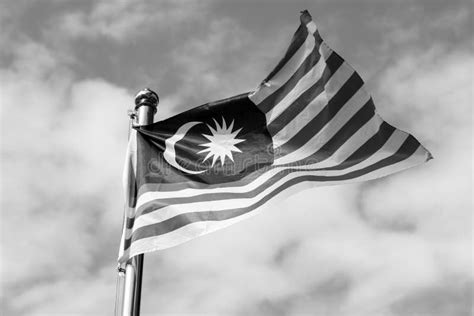 Malaysia Flag Also Known As Jalur Gemilang Wave with the Blue Sky Stock ...