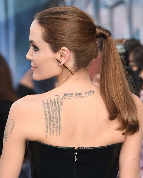 21 Exquisite Angelina Jolie Tattoos with Meanings (2021) From Old Designs to the New Cover ups ...