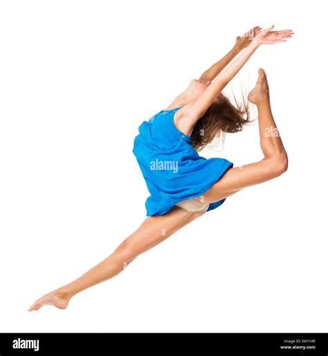 Young girl dancing in a blue dress on a white background Stock Photo - Alamy