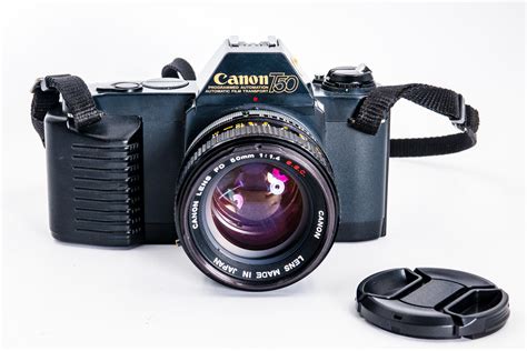 Canon T50 SLR Film Camera with Canon FD 50mm F1.8 lens, Programmed Automation, Automatic Film ...