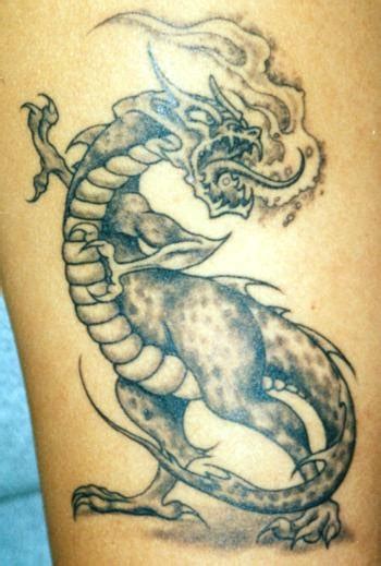 tattoo dragon: Fire breathing dragon tattoo