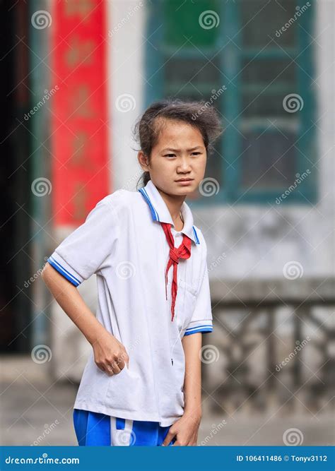 Young Girl Wearing School Uniform, in Front of Her Home, Sanya, China Editorial Photo - Image of ...