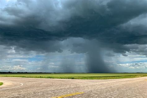 What is a microburst and how do pilots respond to them?