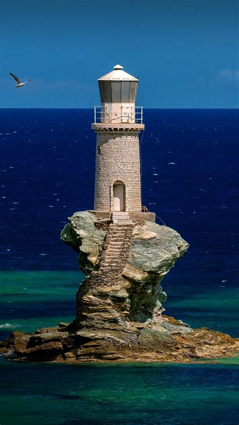 Tourlitis Lighthouse in Chora on Andros island, Cyclades, Greece | Windows Spotlight Images