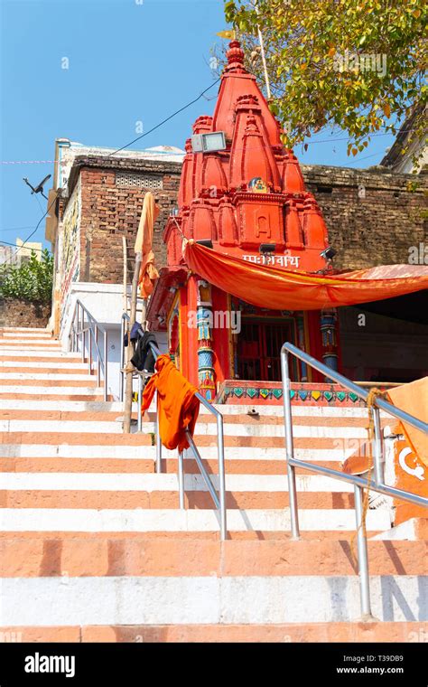 VARANASI, INDIA, MAR 10 2019 - Small Shiva temple on Embankments of the ...