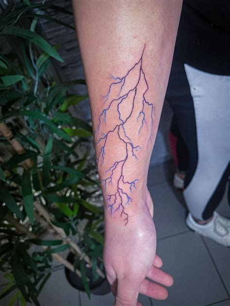 Blue Lightning Tattoo | Lightning tattoo, Blue ink tattoos, Purple tattoos