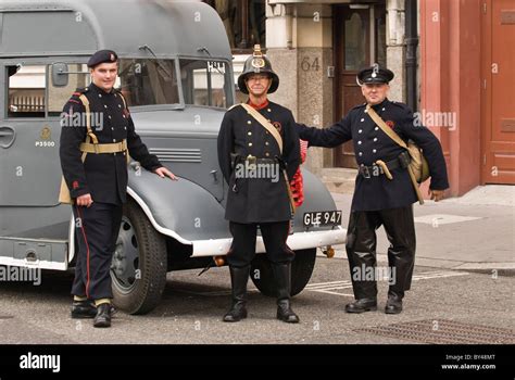 Firefighters dressed in uniforms second world war Austin Fire engine 1940s London Part of ...