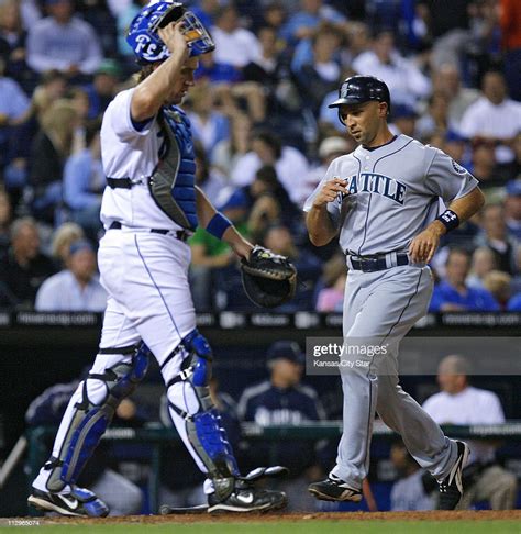 Seattle Mariners' Raul Ibanez passes Kansas City Royals catcher John ...