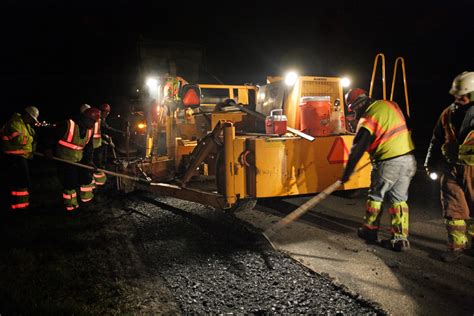 Asphalt paving machine during night operations to mill an… | Flickr